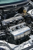 the engine compartment of a car with the hood open