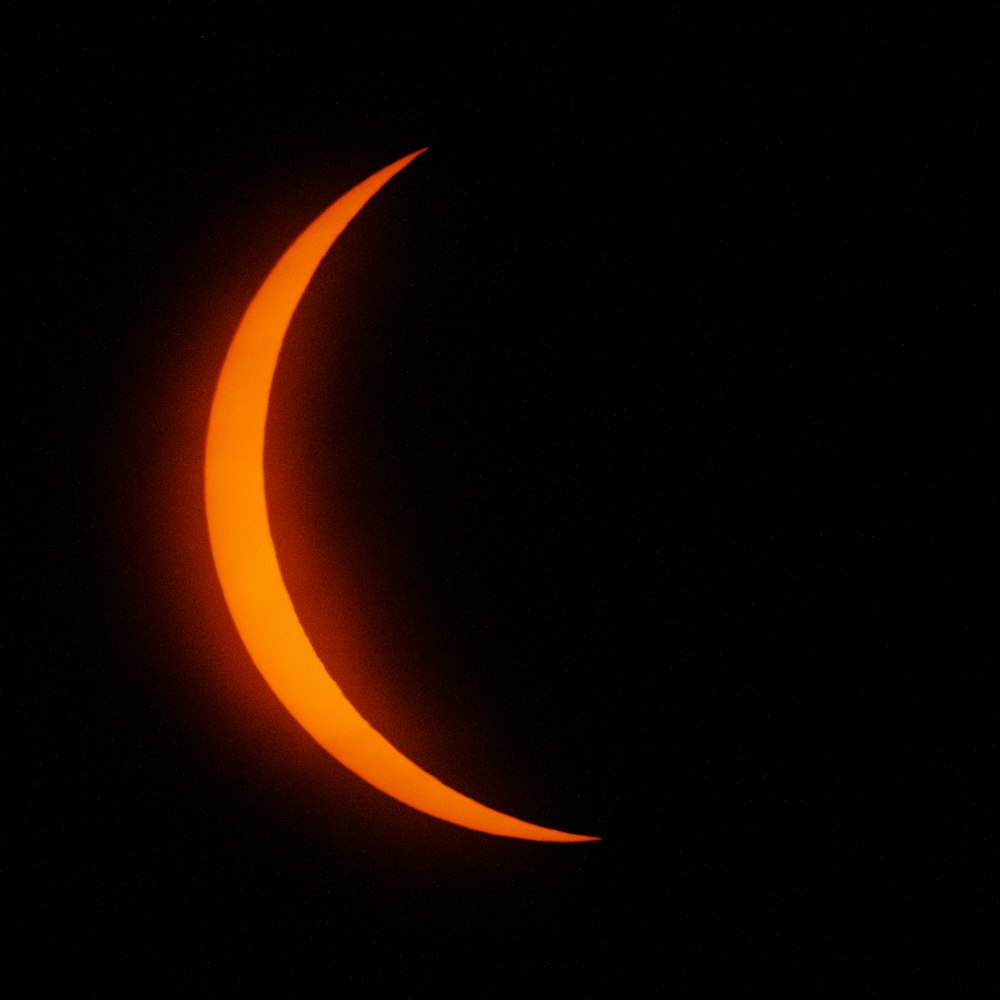 a partial eclipse of the moon during a solar eclipse