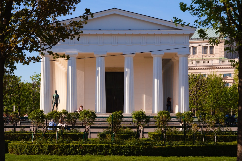 a large white building with columns and pillars