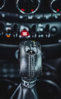 a close up of a steering wheel in a car