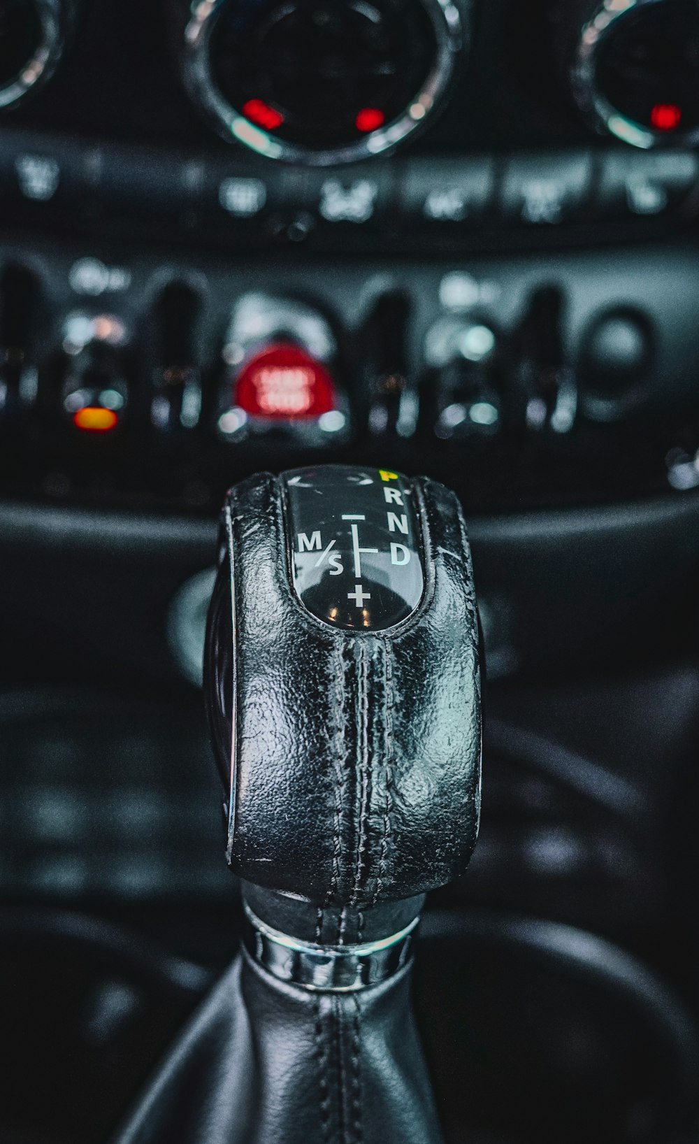 a close up of a steering wheel in a car