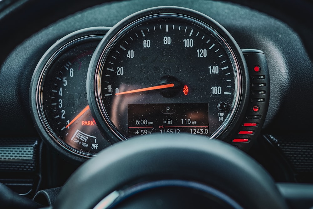 a close up of a speedometer in a car