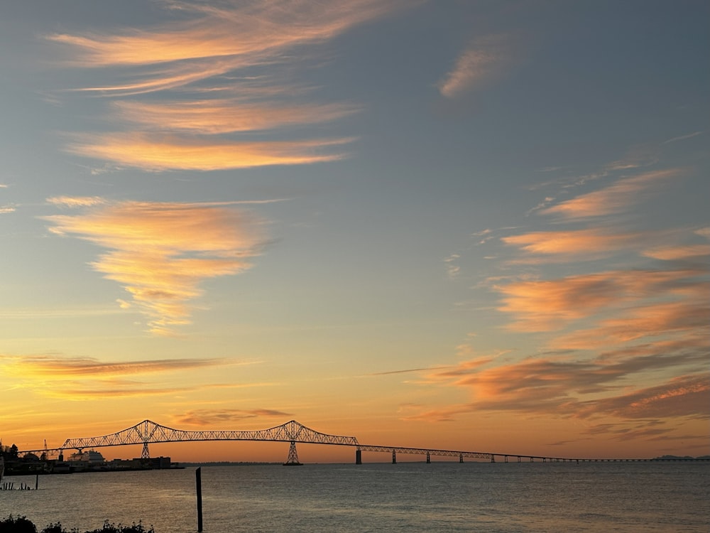 a large bridge spanning over a large body of water