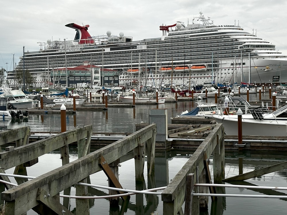 a large cruise ship docked at a dock