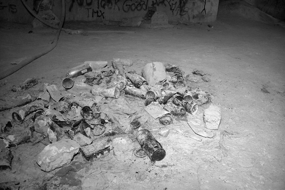 a black and white photo of a pile of trash