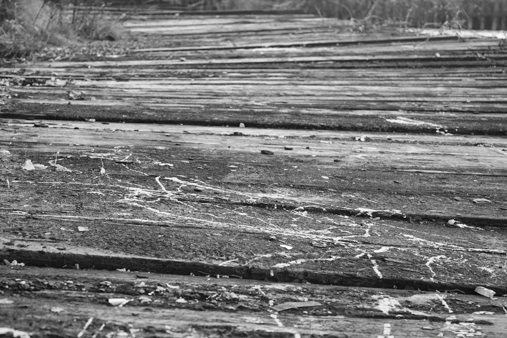 a black and white photo of a train track