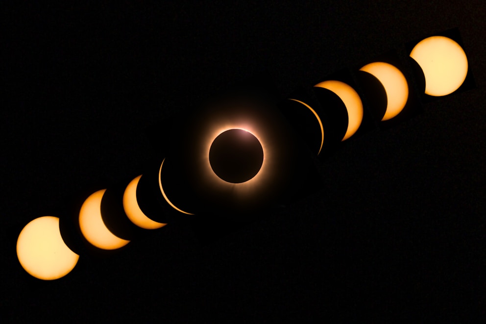 a solar eclipse is seen in the dark sky