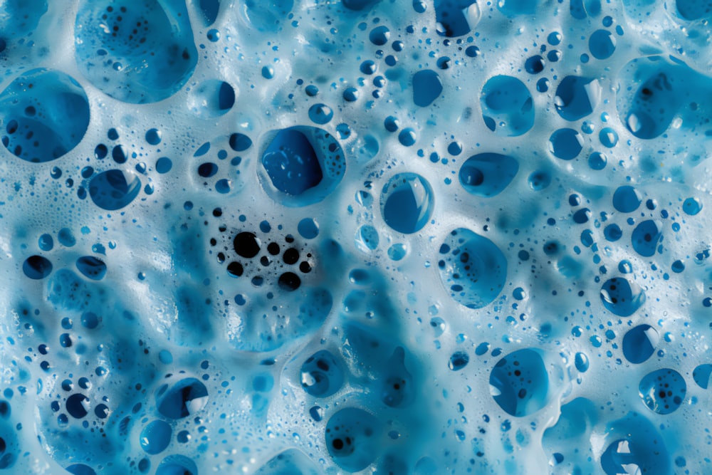 a close up of water bubbles on a surface