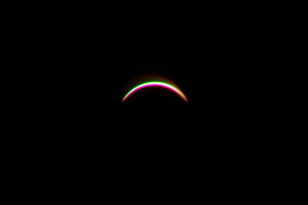 a close up of a ring in the dark