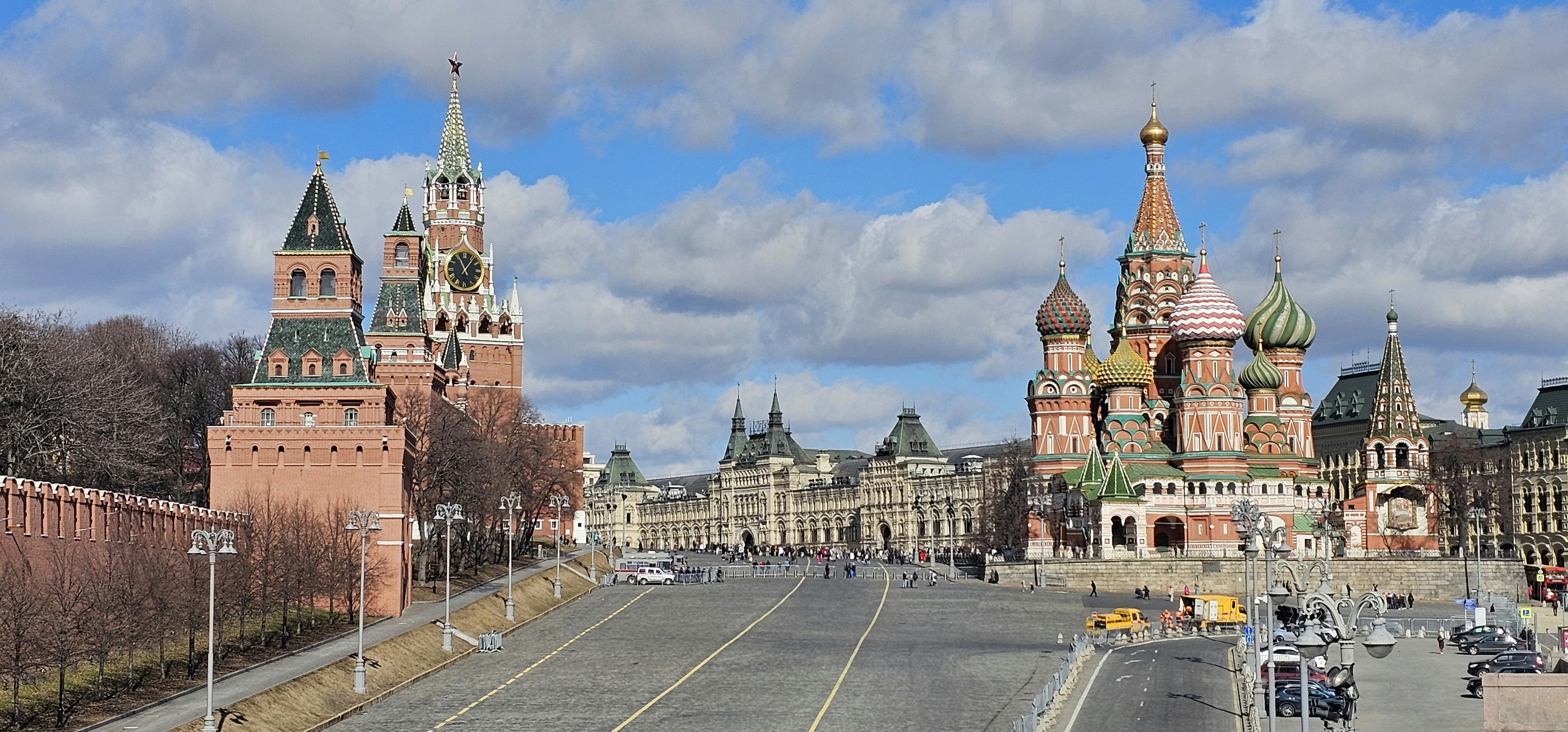 a city street with a lot of tall buildings