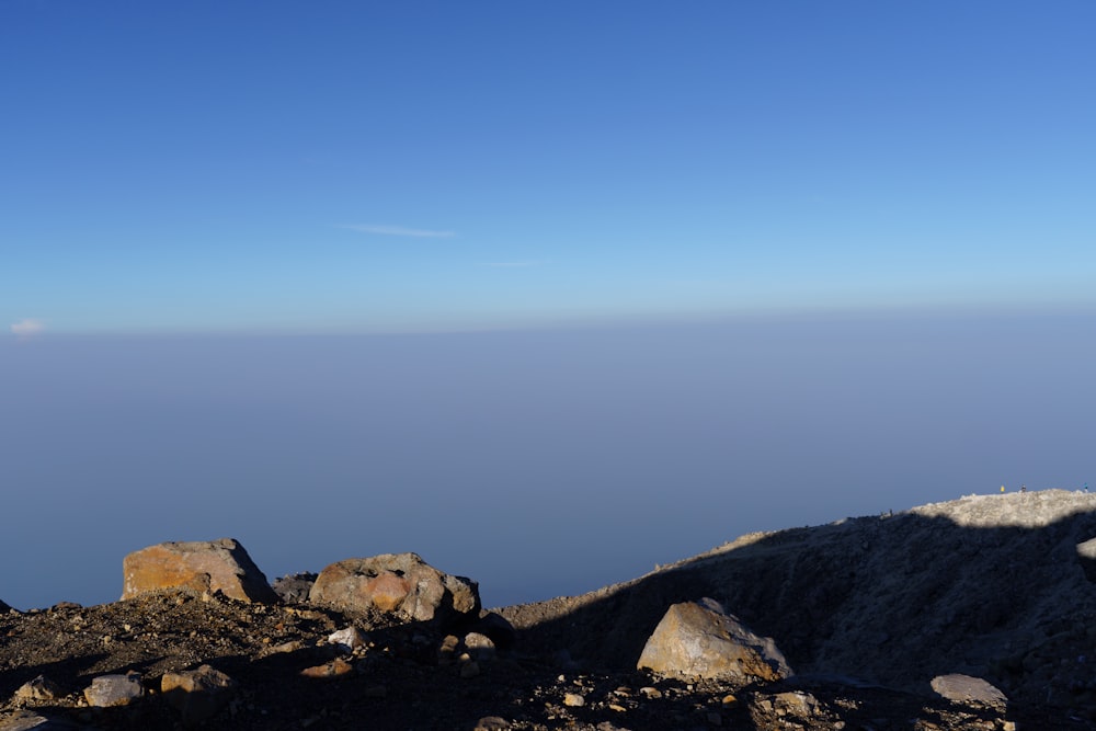 a person standing on top of a mountain