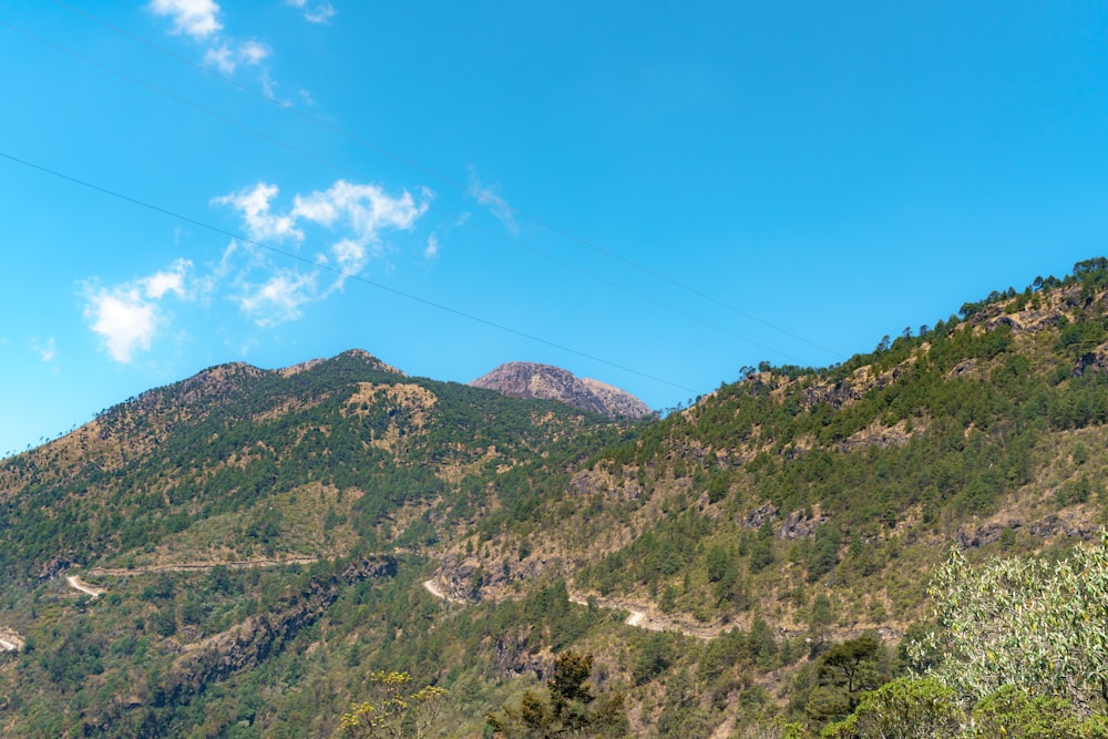 a mountain with a road going through it