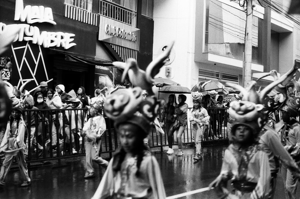 a group of people that are standing in the street