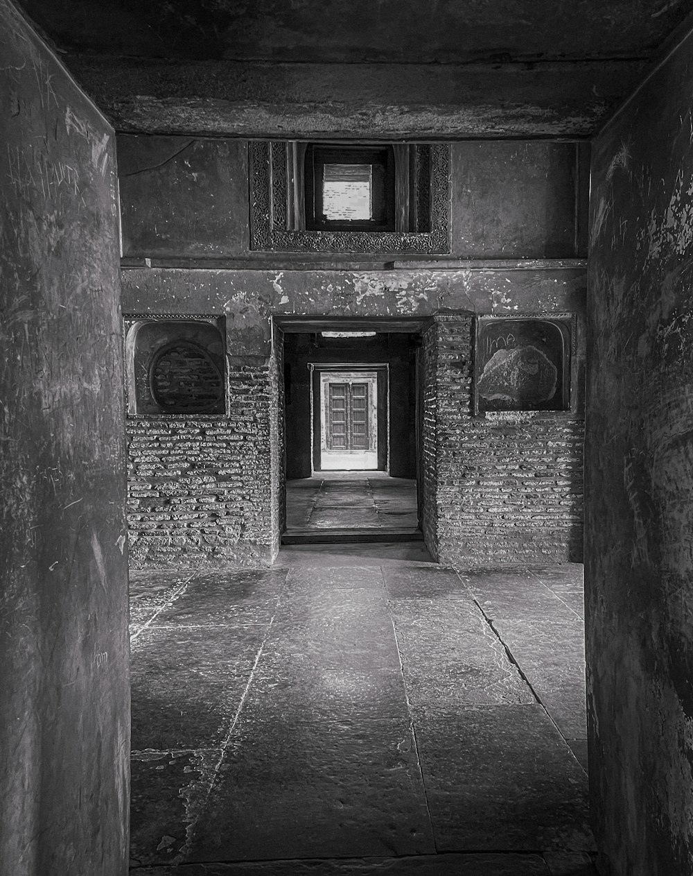 a black and white photo of an empty room