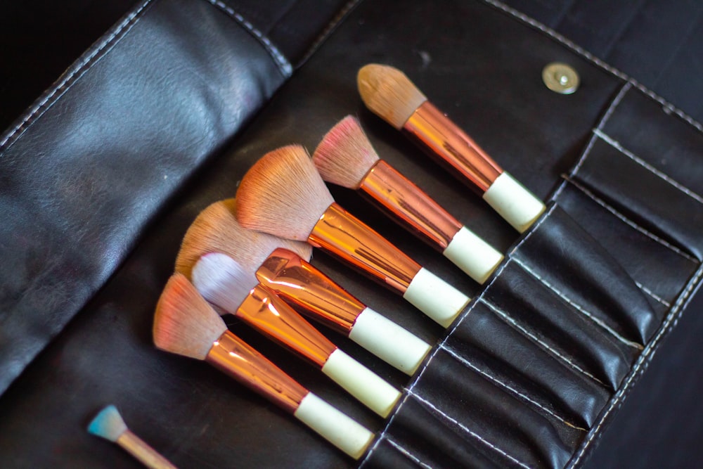 a close up of a set of makeup brushes
