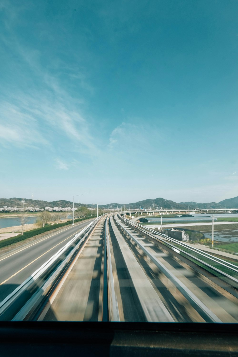 a view of a highway from a moving vehicle