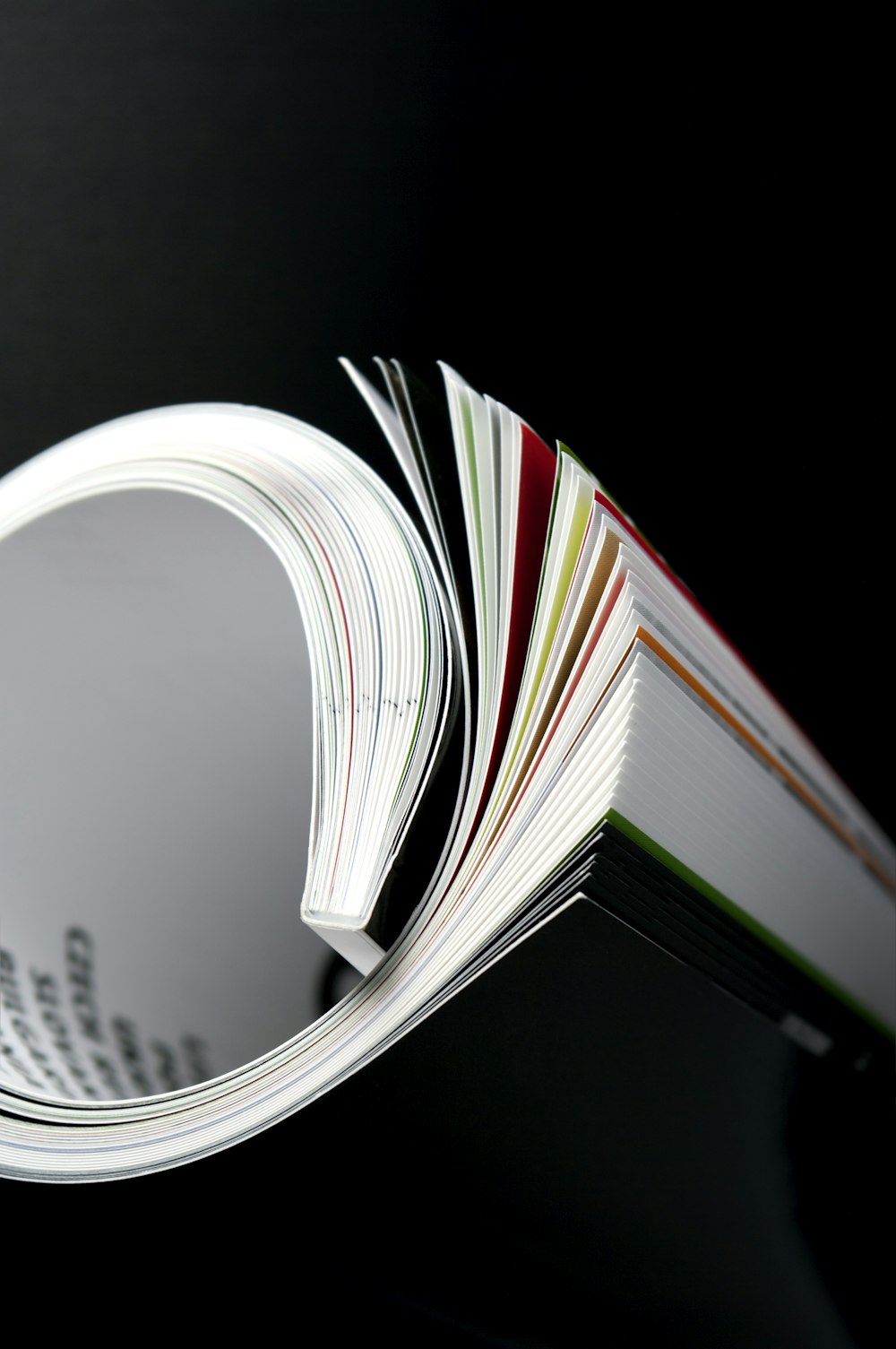 a close up of an open book on a table