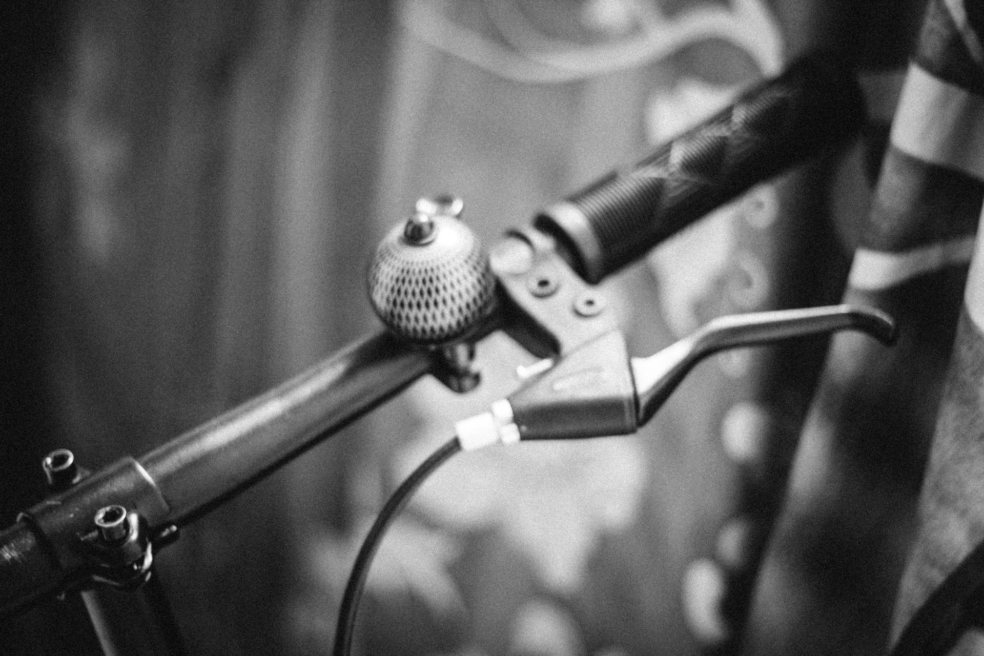 a black and white photo of a bike handle