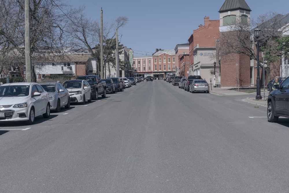 a row of parked cars on a city street