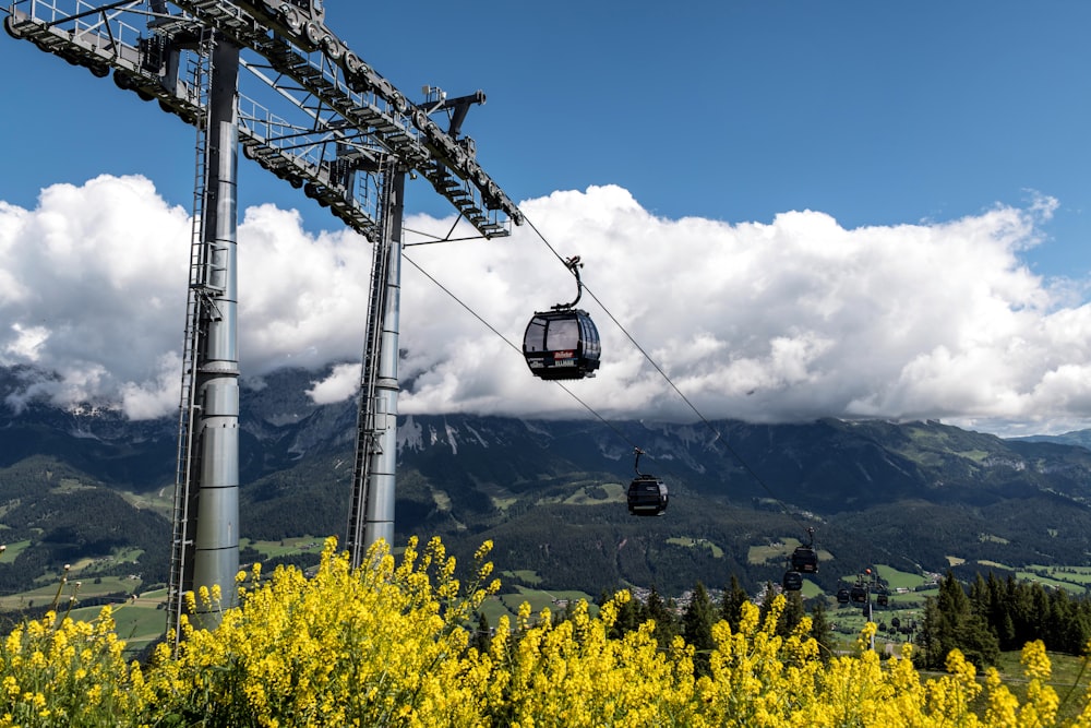 a gondola with a view of a mountain range