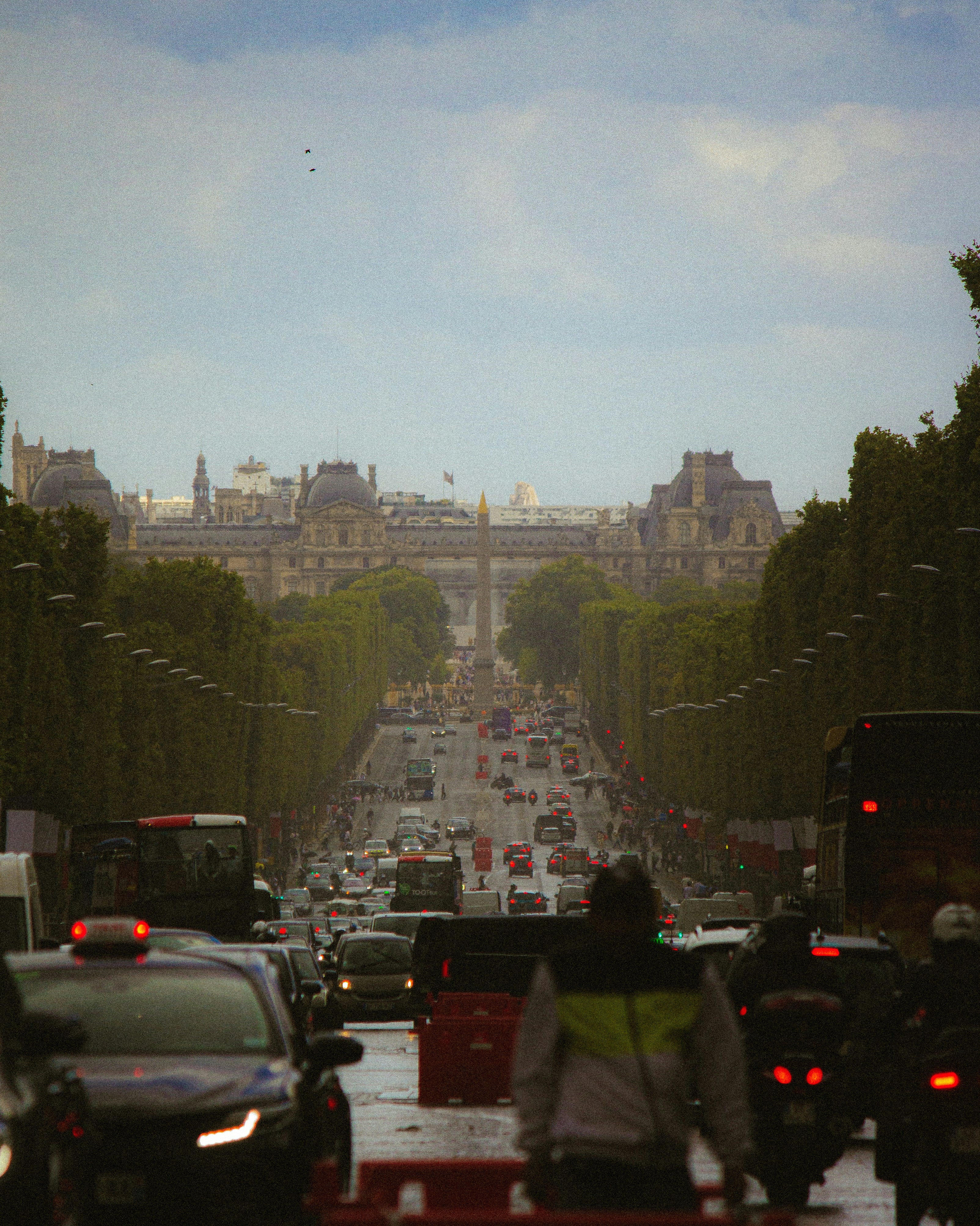 a city street filled with lots of traffic