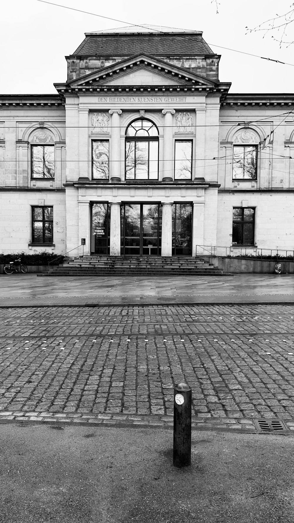 a black and white photo of a large building