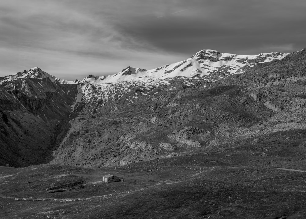 a black and white photo of a mountain range