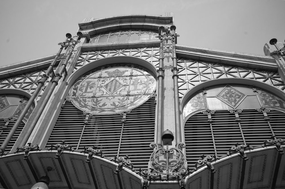 a black and white photo of a clock tower