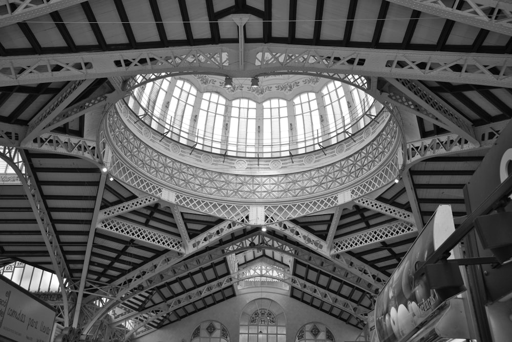 a black and white photo of a train station