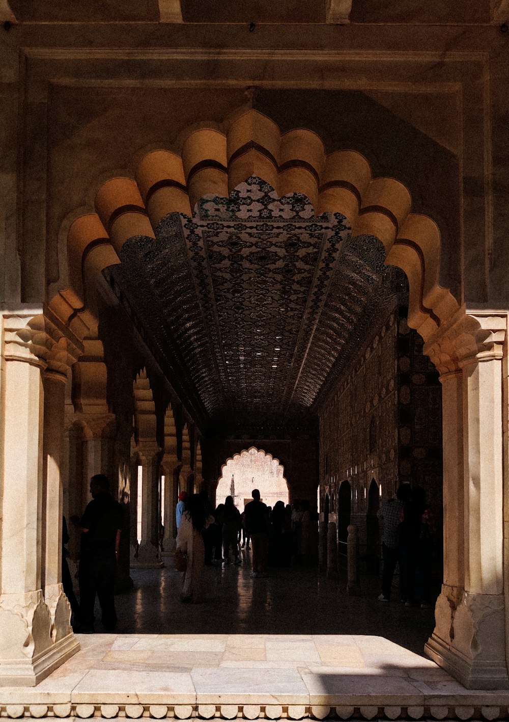 a group of people standing in a building