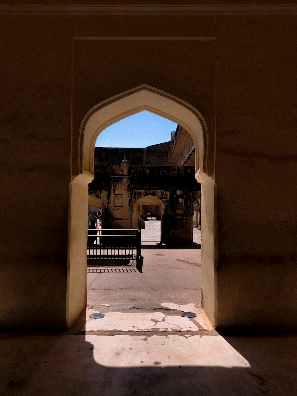 a view of a building through an archway