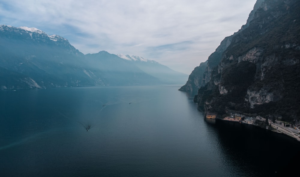 a large body of water surrounded by mountains