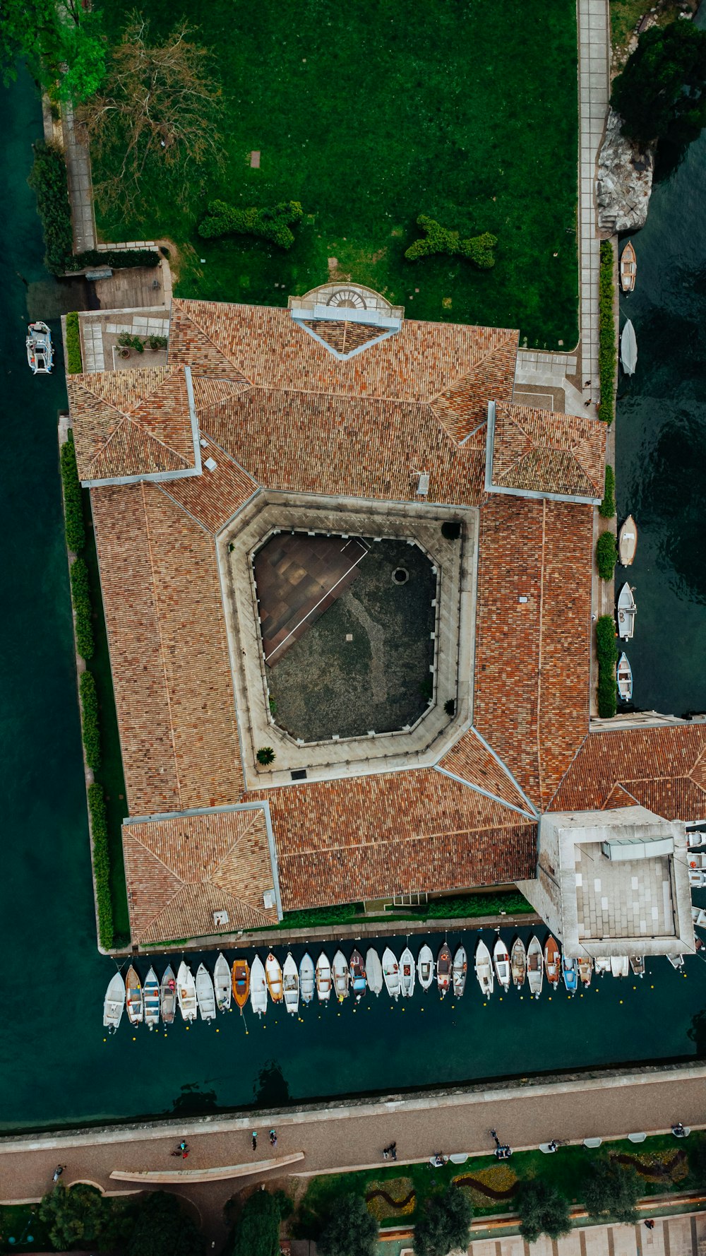 an aerial view of a boat dock and a building