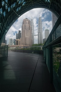a view of a city from a walkway