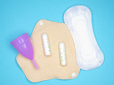 a pair of baby's shoes and a pair of baby's toothbrush