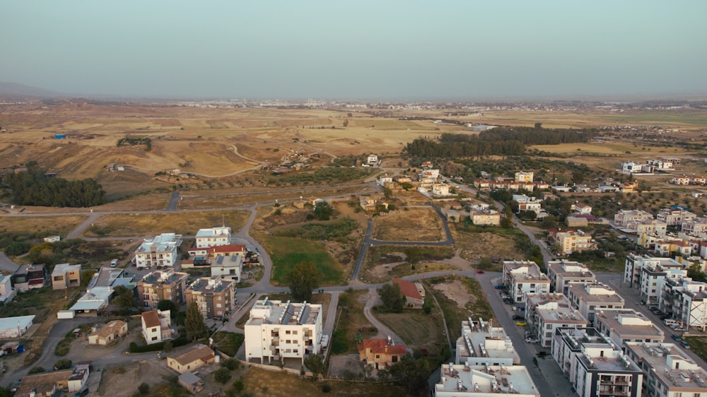 an aerial view of a city with lots of buildings