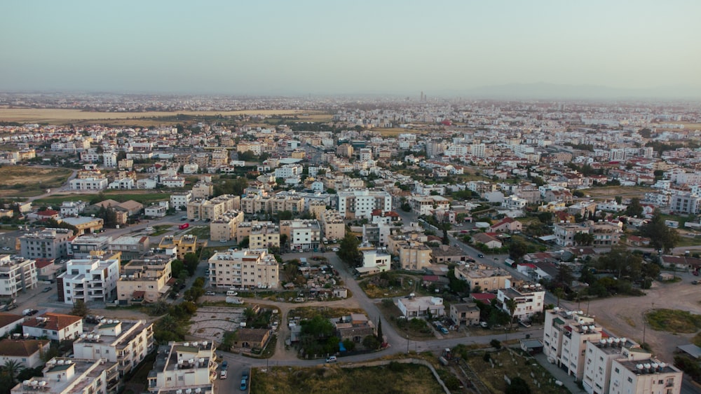 an aerial view of a city with lots of buildings