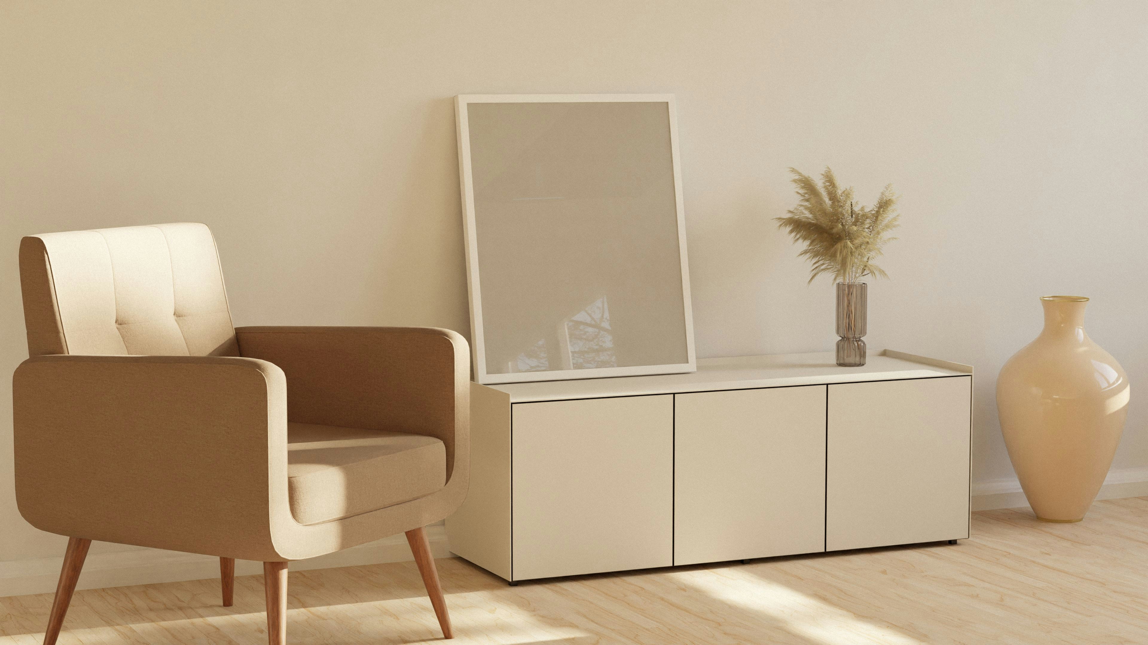 a chair and a vase in a room