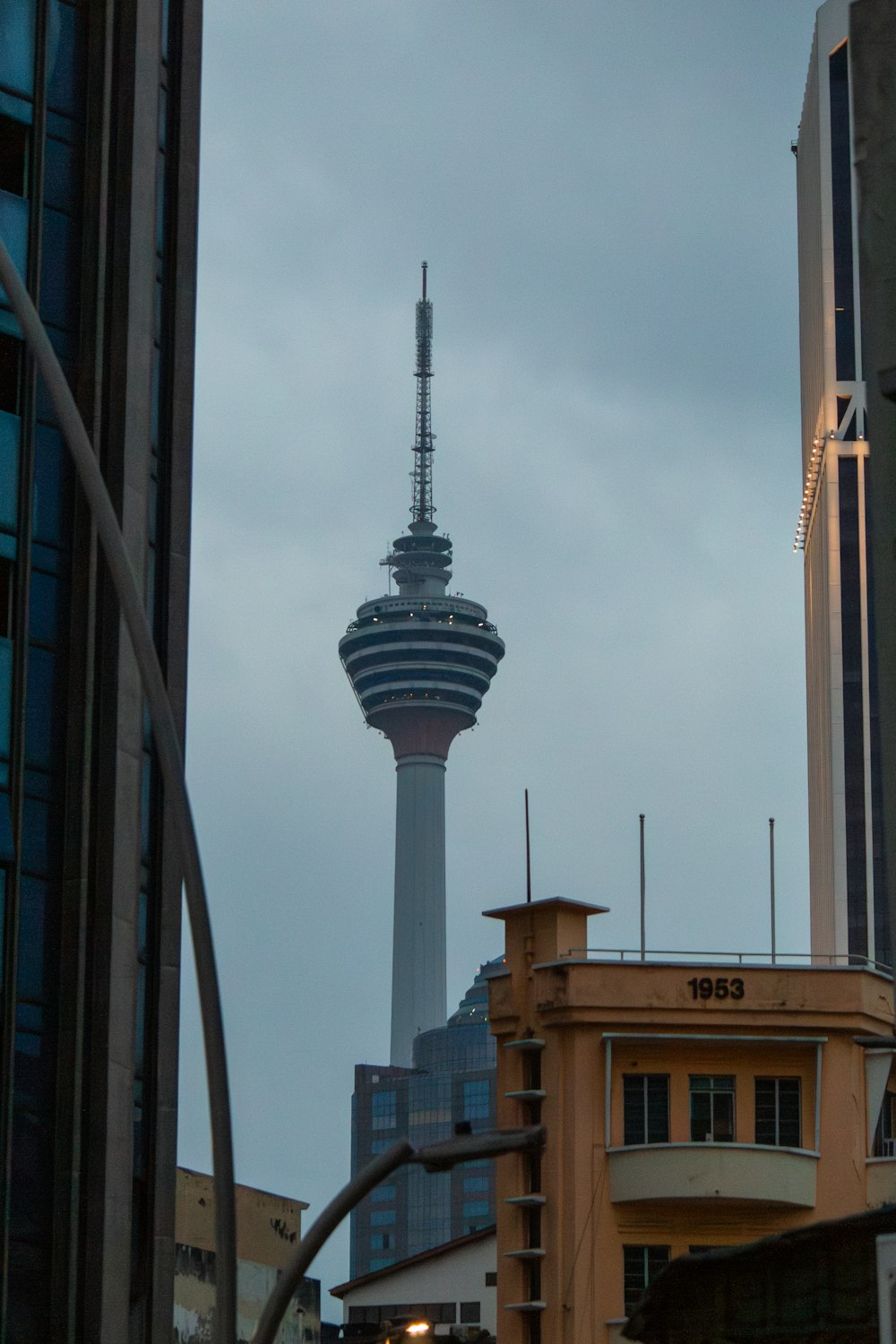 a very tall tower towering over a city