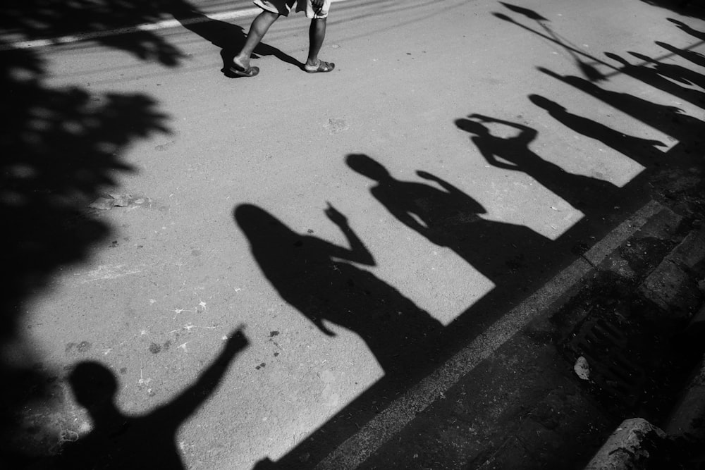 a group of people walking down a street