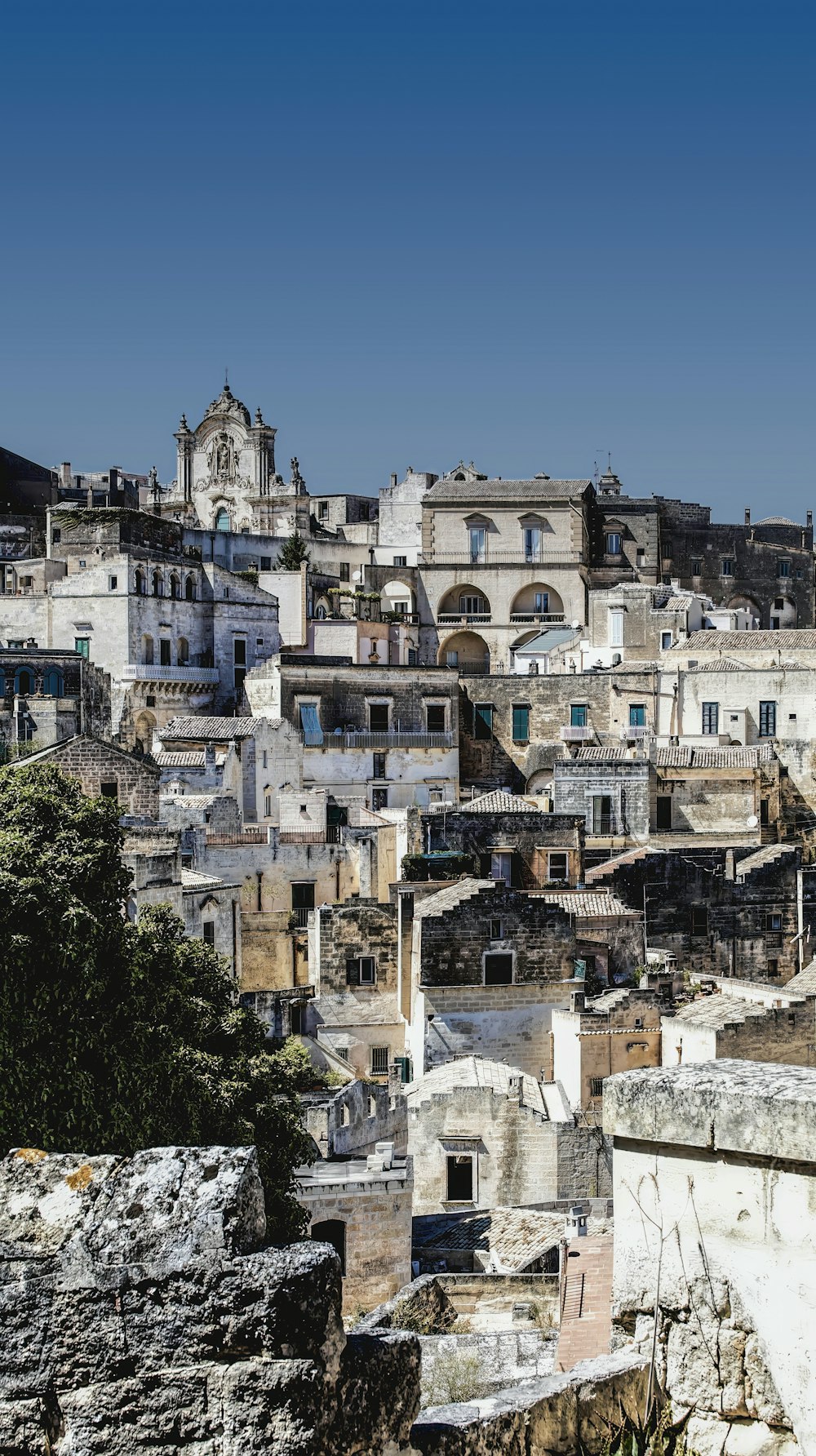 a view of a city from a hill