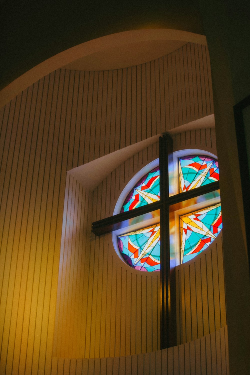 a stained glass window inside of a church