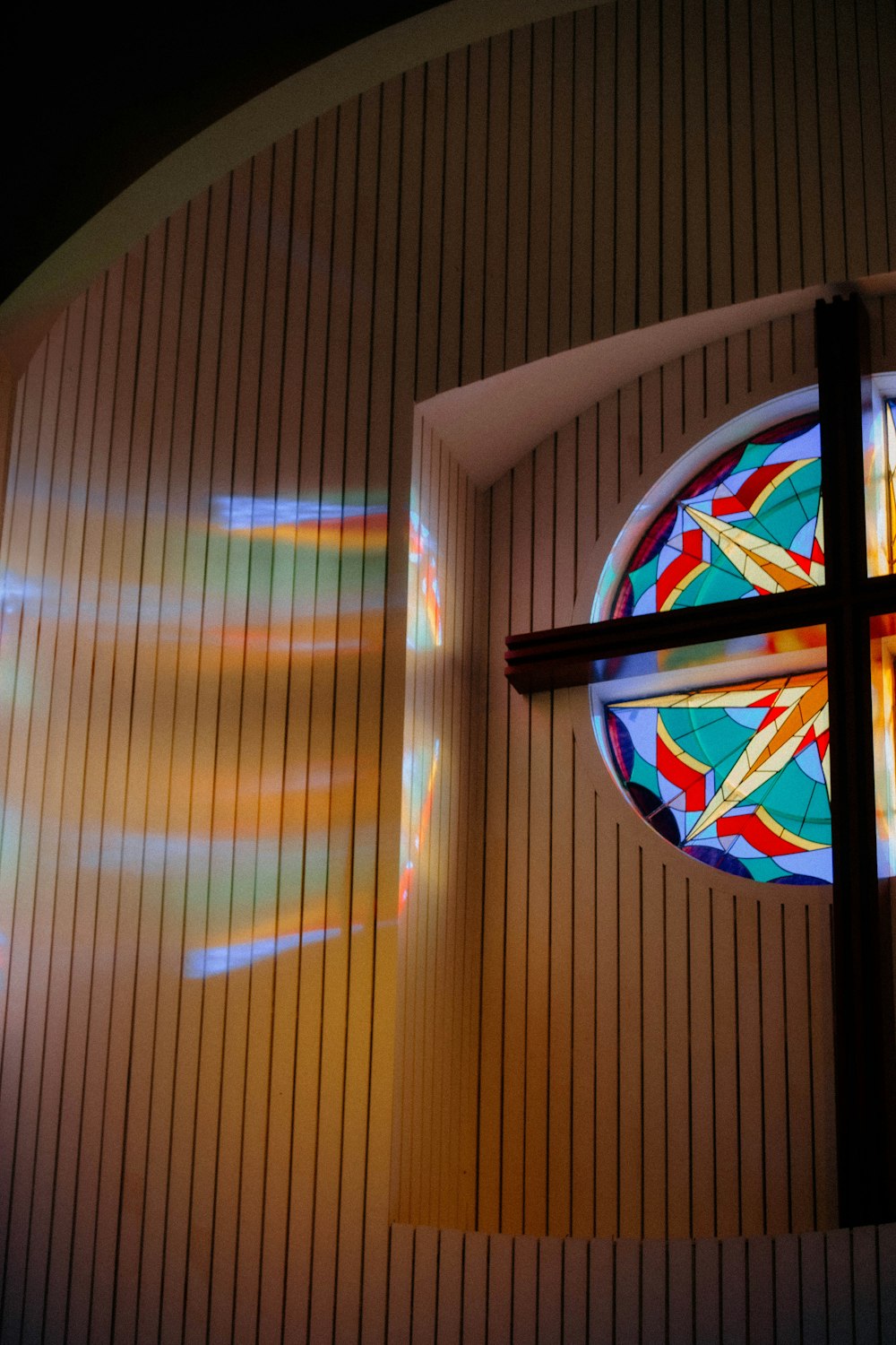 a stained glass window inside of a church