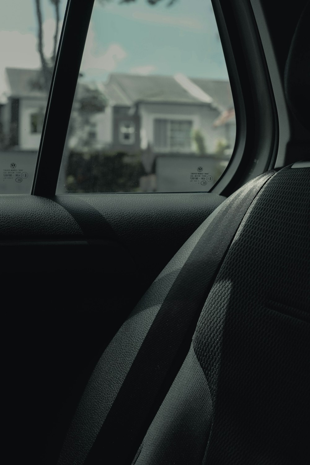 a view of a house from inside a car