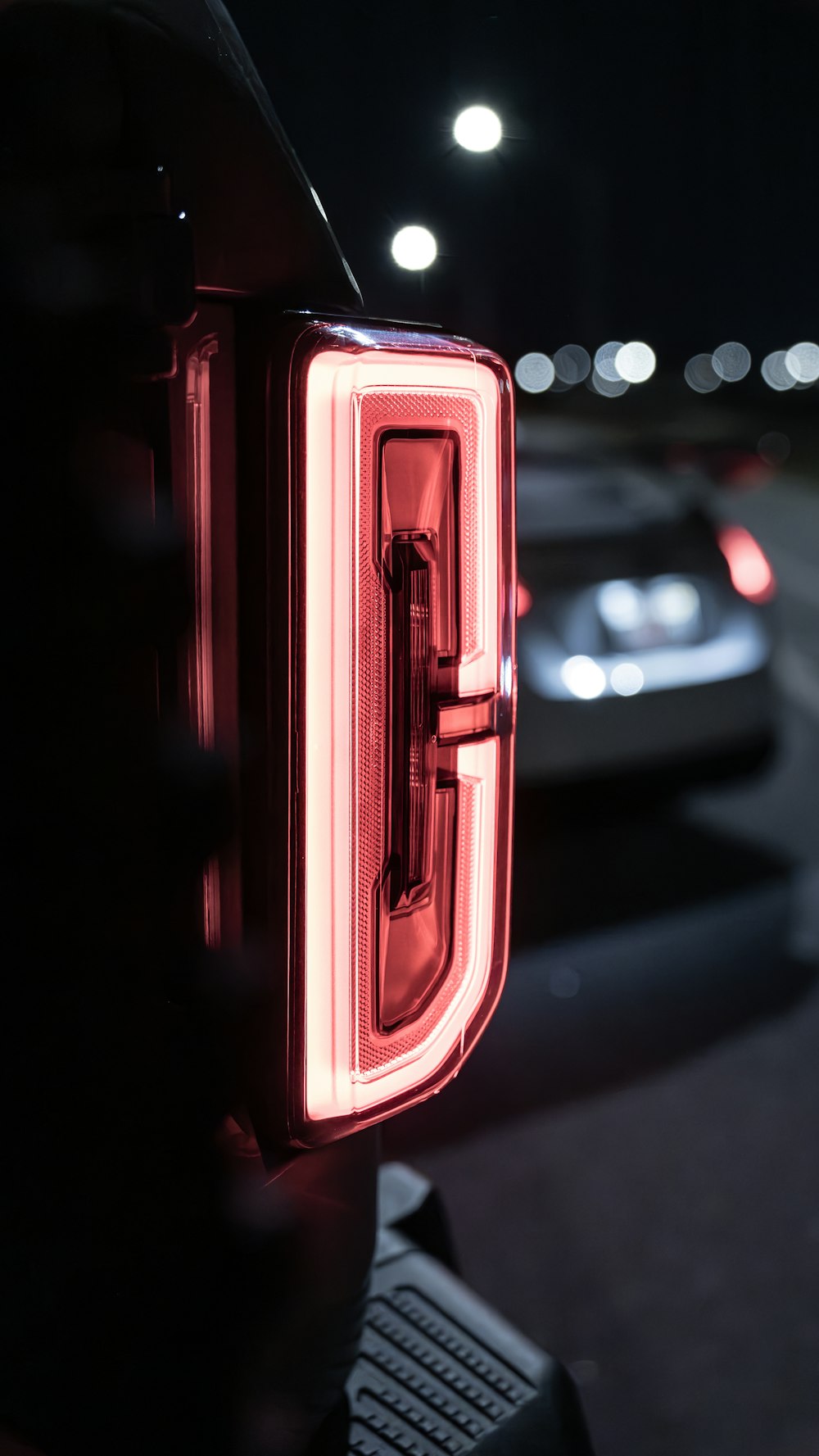 a close up of the tail light of a car