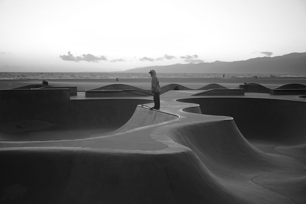 a person riding a skateboard at a skate park