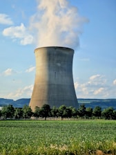 a nuclear power plant emitting smoke into the sky