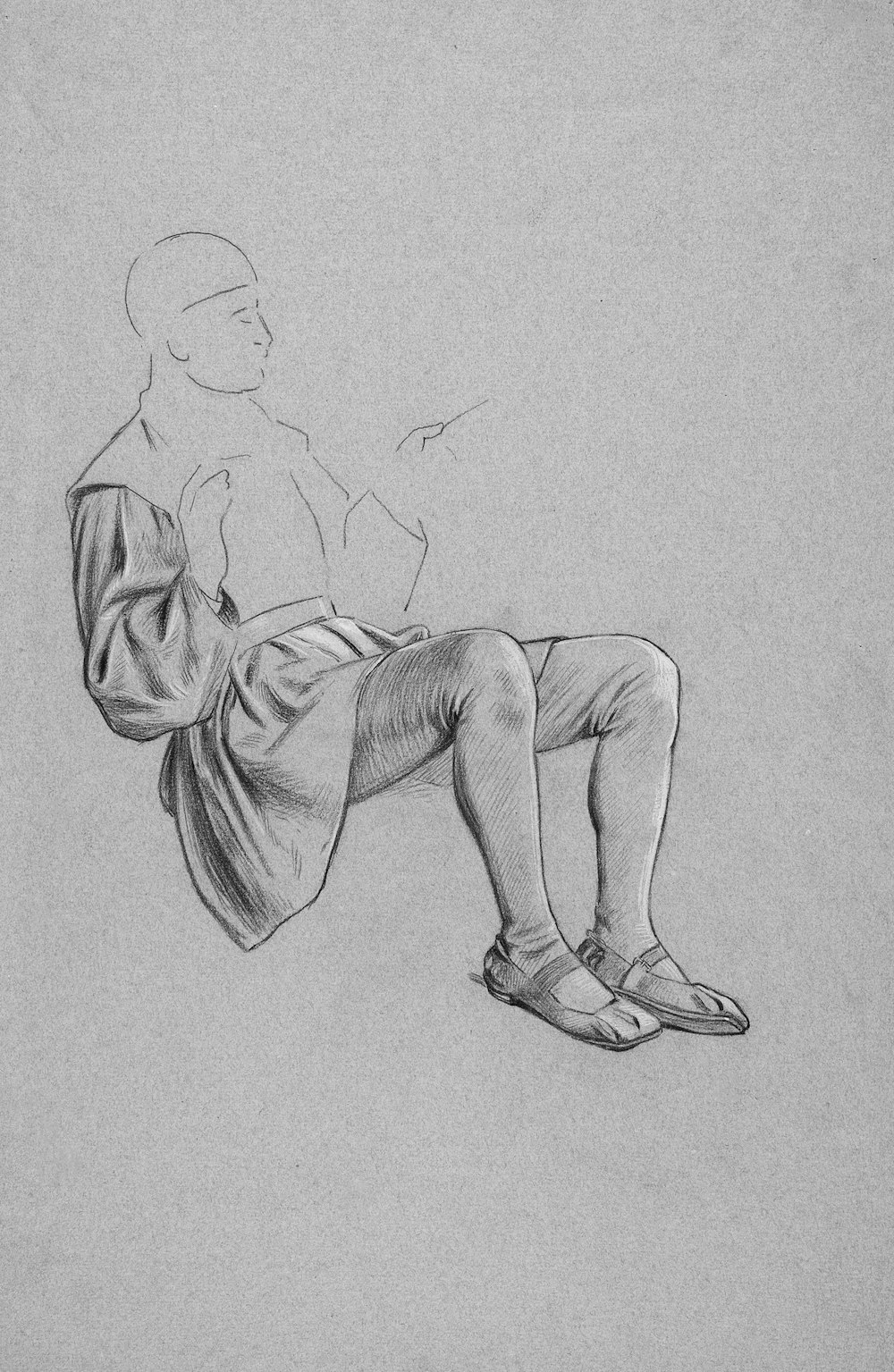 a drawing of a person sitting on the ground