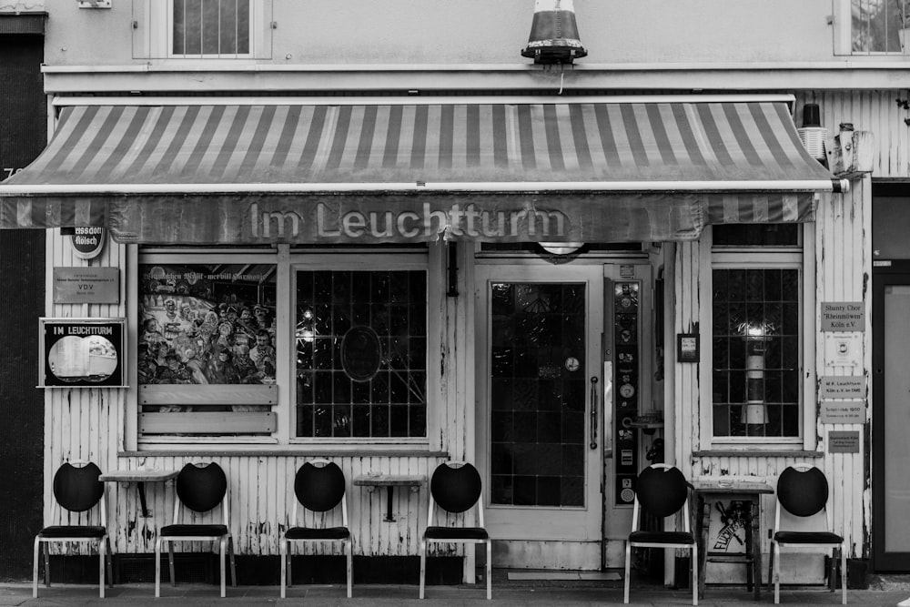 a black and white photo of a restaurant