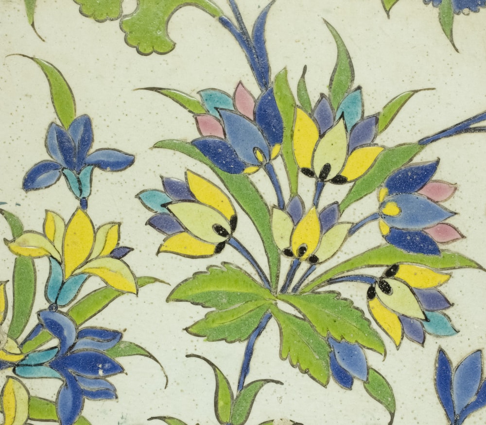 a close up of a flower design on a wall